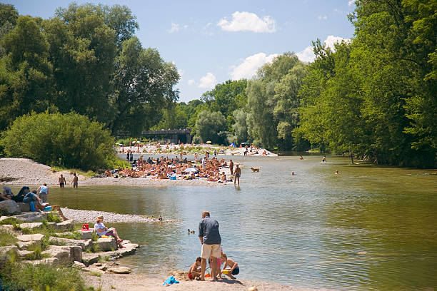 Naked on the Isar beach Hot summer afternoon in Munich river swimming women water stock pictures, royalty-free photos & images