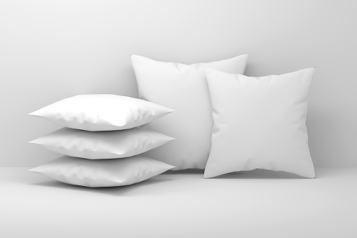 Set of five white blank pillows with blank surfaces. 3d render.