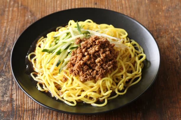 Chinese soy sauce noodles with minced meat stock photo