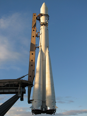 Space rocket at the launch pad in the evening