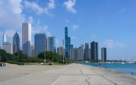 Chicago Lakefront trail with downtown skyline and Navy Pier in the distance