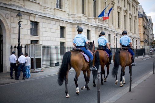 London, United Kingdom - September 10, 2022: Mounted police officers ride the street in London