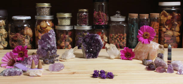 istock Amethyst Crystals and Flowers On Meditation Table 1442891182