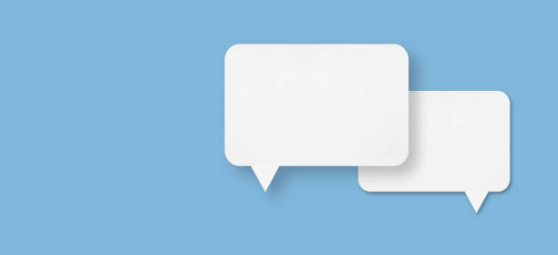 istock white paper with speech bubbles isolated on blue background communication bubbles 1442894404