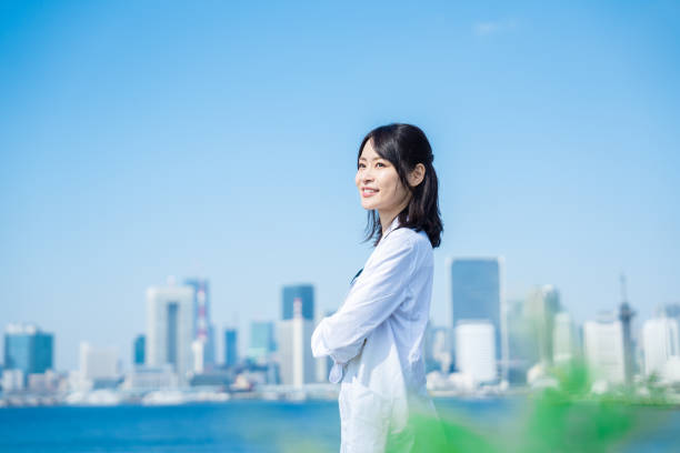 istock Female doctor walking outside with a smile 1442895416