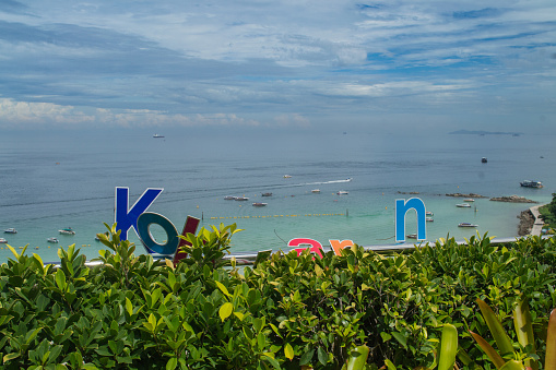 Tawaen beach of Koh Larn or coral island, Thailand has this viewpoint. But unfortunately, the sign has been broken probably due to a storm or bad weather. The local authority should take of it ASAP because tourists love this point. This picture was taken on 10/09/2022 at 9:21 am with a dramatic sky as a background.