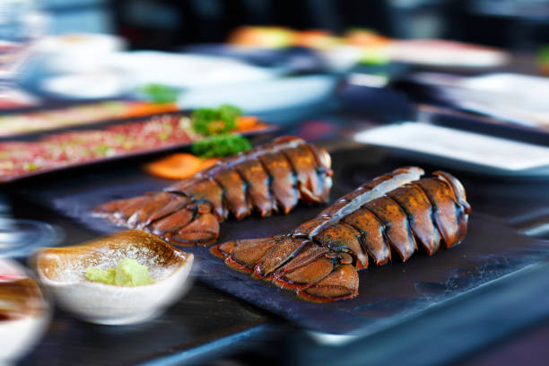 istock Lobster cut in half placed on a black stone 677.jpg 1442897676