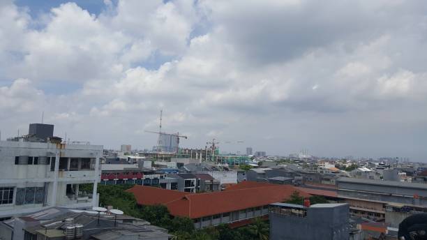 istock Jakarta city skyline from above an office building 1442898414