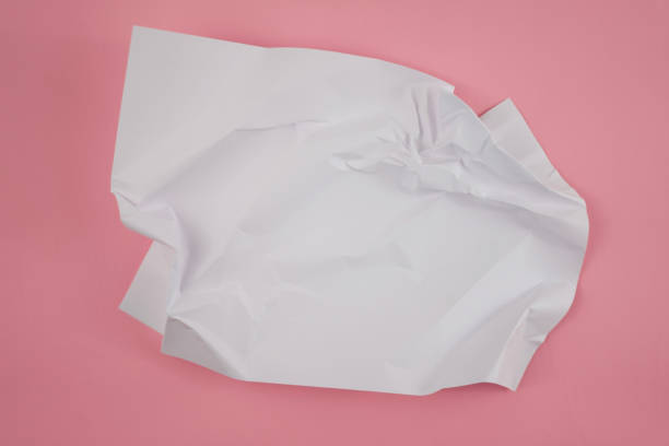 istock Abstract crumpled paper texture isolated in pink background 1442898627