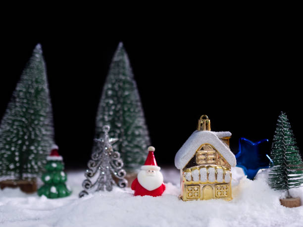 istock Santa Claus on White Snow with Blur Christmas Tree Background 1442900349
