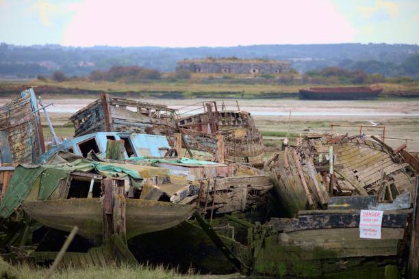 istock Boat wrecks at Hoo marina 1442902613