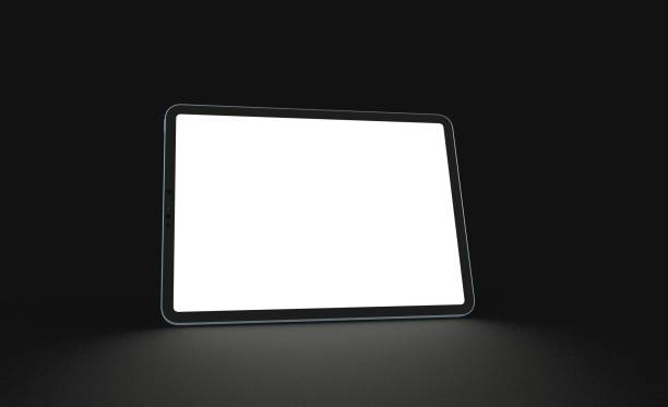 istock 3D rendering of a tablet with a blank screen in the dark background 1442903367