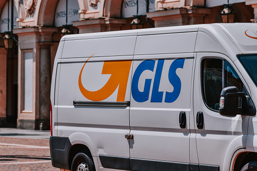 Turin, Italy – July 21, 2021: A closeup shot of a white GLS delivery truck in the center of Turin City, Italy.