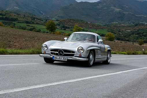 Cagli, Italy – May 19, 2017: A racing vintage Mercedes 300 SL on the road