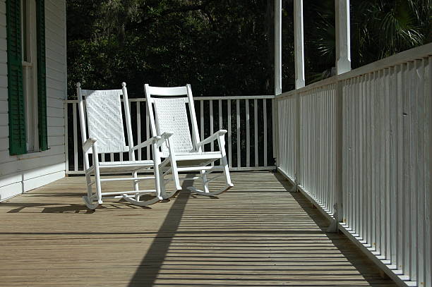 istock Two Rocking Chairs on a Porch 144290805