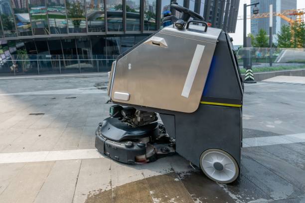 istock Automatic clean machine mopping outside of modern office building. 1442908371
