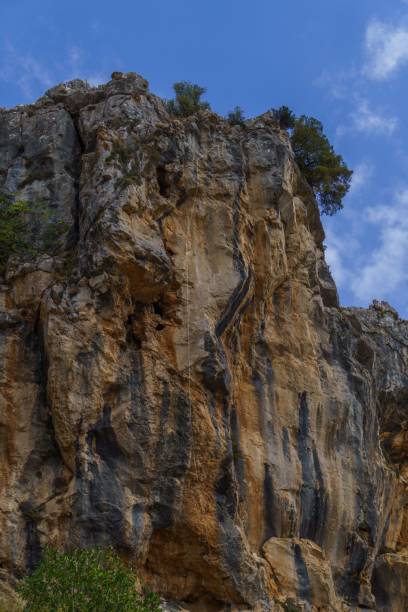 istock mountain with safety rope for climbing 1442908690