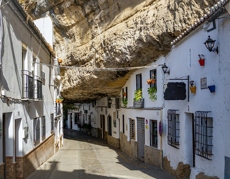 ronda, Spain – August 08, 2021: setenil de las bodegas tourist village in the province of cadiz , andalucia