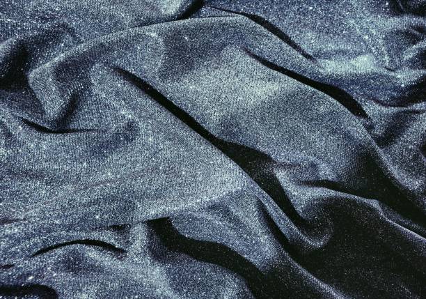 istock Closeup of a shiny dark blue fabric 1442911980