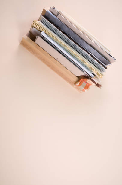 istock Close updocuments isolated on beige color background with free s 1442913552
