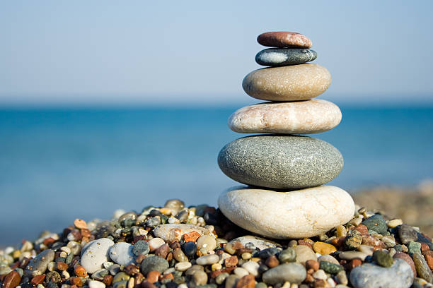 istock Close-up of stacked pebbles among countless small pebbles 144291480