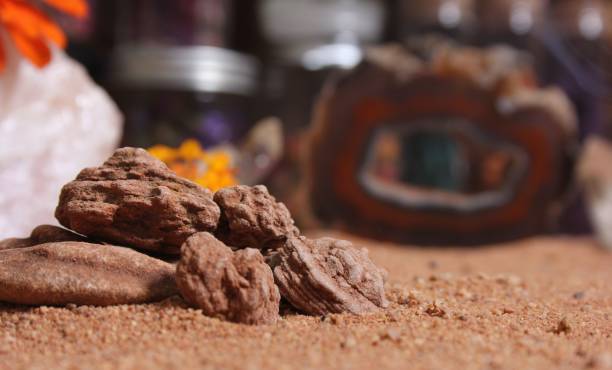 istock Desert Rose Rocks From Oklahoma on Red Sand. Meditation Table Close up 1442914946