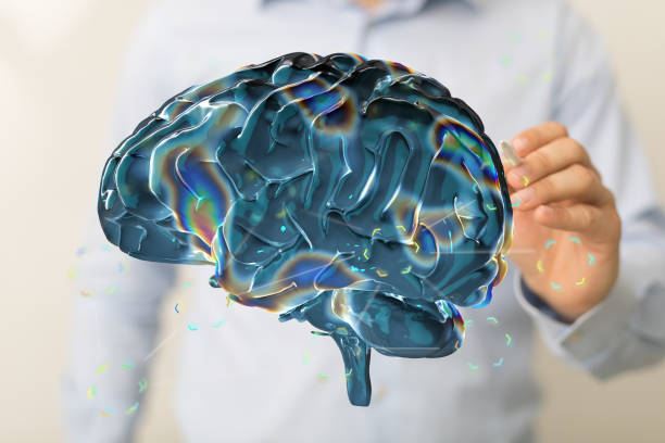 istock Man tapping on a 3D rendering of a brain - artificial intelligence and creativity concept 1442915369