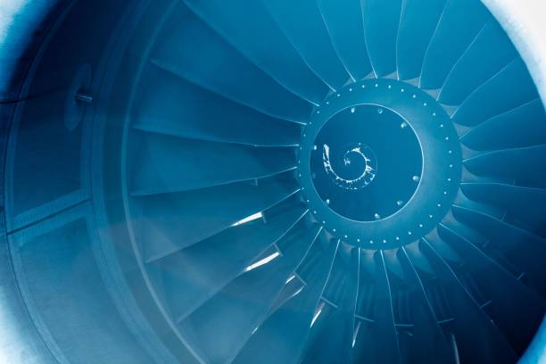 Close Up on a huge jet engine with blue filter and light leaks