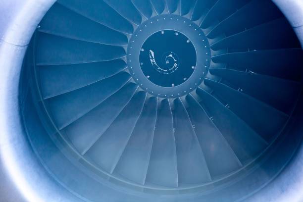 istock Close Up on a huge jet engine with blue filter and light leaks 1442915743
