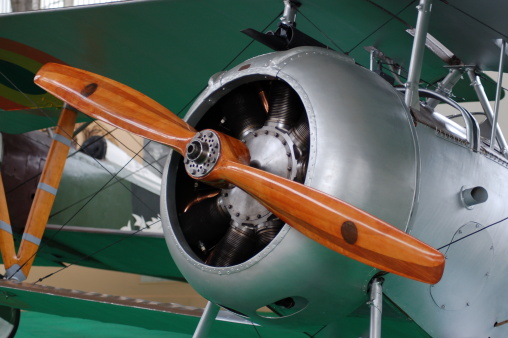 Close up colour image of a propeller of a plane with sky in background and copy space.