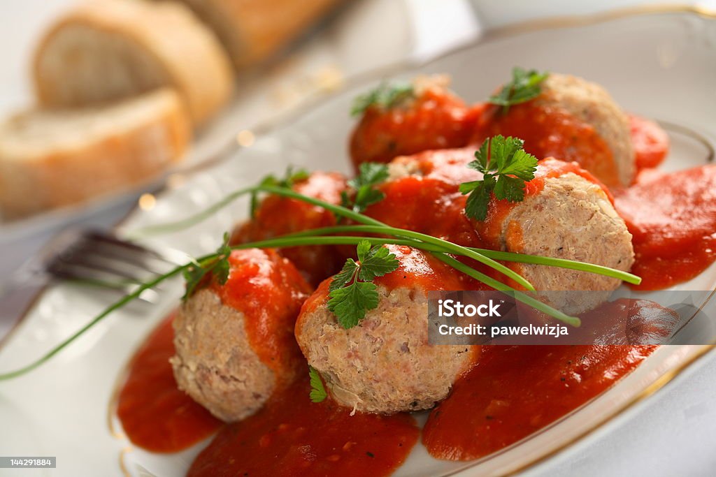 Meatball with tomatoes dressing Tasty meatball with tomatoes dressing and chives Bread Stock Photo