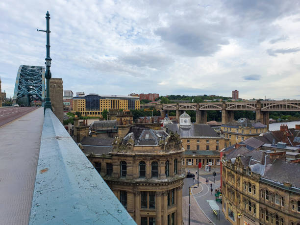 istock Old buildings in Newcastle pictured from a rusty Tyne bridge looking towards Gateshea 1442919973