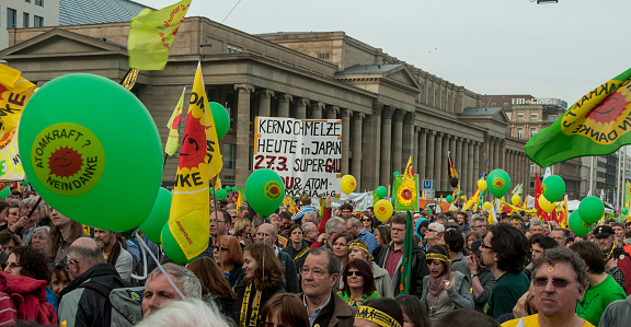 Stuttgart, Germany – March 12, 2011: Demonstration gegen Kernenergie direkt nach der Reaktorkatastrophe in Fukushima. Parolen: \