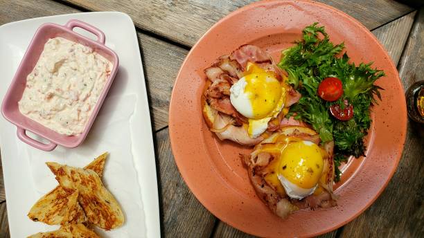istock Closeup shot of eggs Benedict breakfast 1442921310