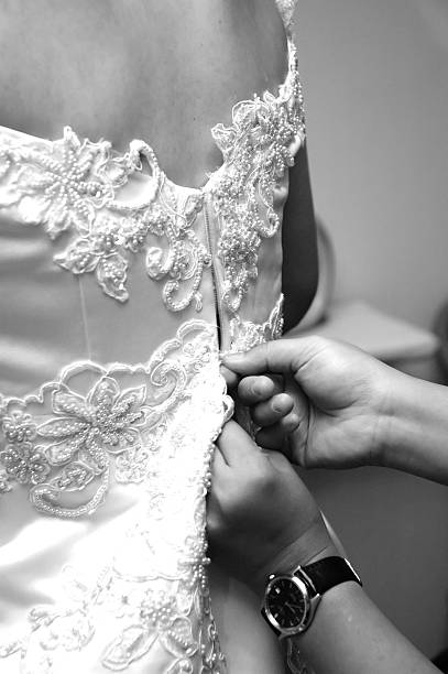 istock Zipping up the bride 144292691