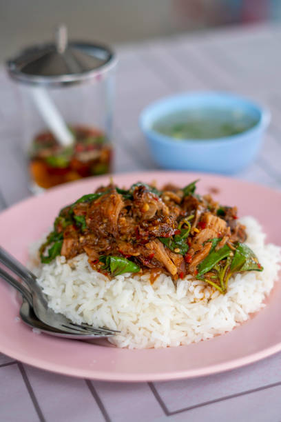 Stewed Pork Leg Stir fried with Thai Basil Braised pork on rice in Thailand. with stir-fried braised pork and basil. Thai food, spicy food. stew photos stock pictures, royalty-free photos & images