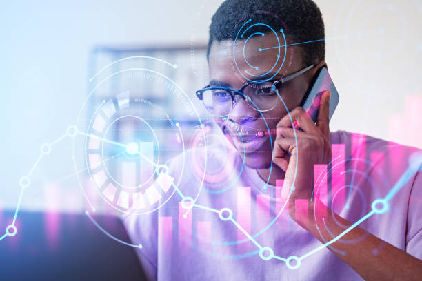 istock African businessman talking on the phone, big data diagrams with 1442930727