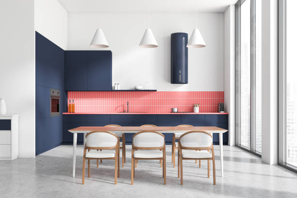 istock Stylish kitchen interior with eating table and chairs, panoramic window 1442930796