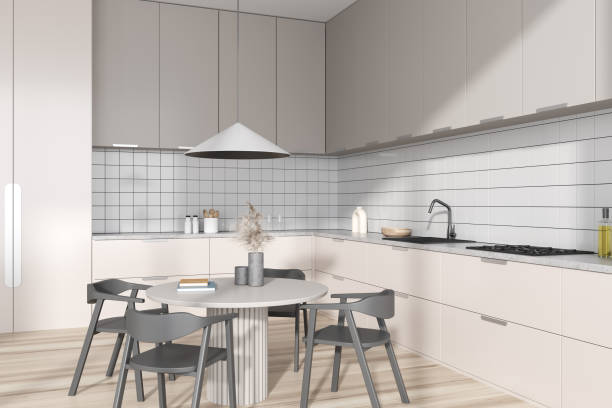 istock Stylish kitchen interior with eating table and chairs, decor and kitchenware 1442930967