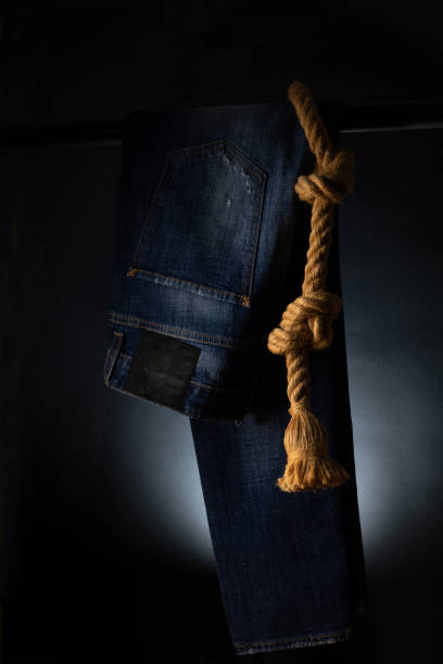 Jeans pant with cord and tape measure Jeans pant with cord and tape measure straight leg pants stock pictures, royalty-free photos & images