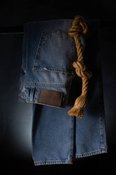 Jeans pant with cord and tape measure Jeans pant with cord and tape measure straight leg pants stock pictures, royalty-free photos & images