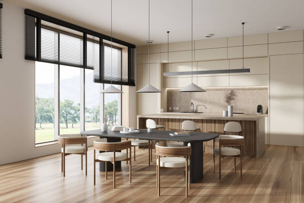 istock Stylish kitchen interior with dining and cooking area, panoramic window 1442932020