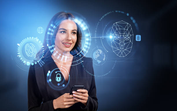 istock Businesswoman using phone, biometric scanning with face detection hologram 1442932116
