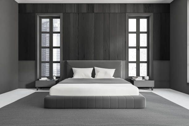istock Grey bedroom interior with bed and decoration, panoramic window. Empty wall 1442933539