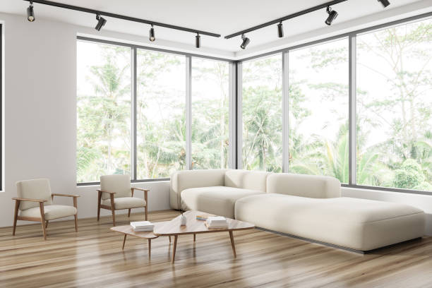istock Light meeting room interior with couch and coffee table, panoramic window 1442933842