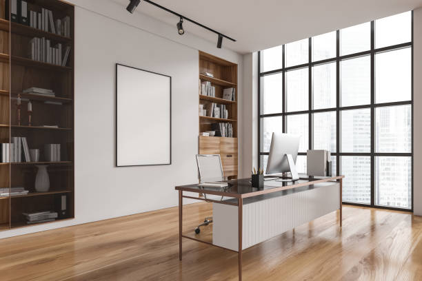 istock Stylish business interior with work desk and shelf near window. Mockup frame 1442933919