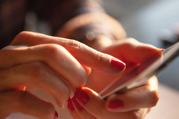 istock Woman scrolling on her smartphone 1442936438