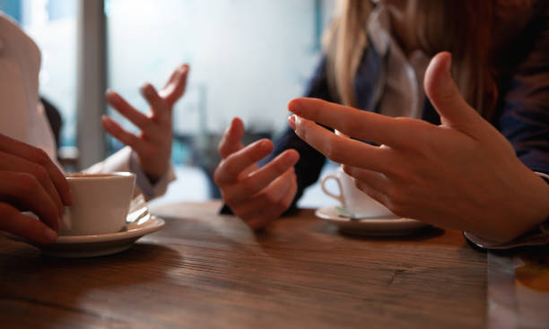 istock Chatting over cup of coffee 1442936661