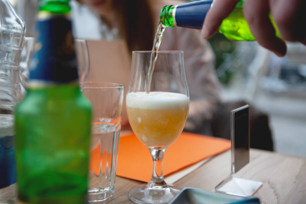 istock Pouring beer into a glass 1442936730