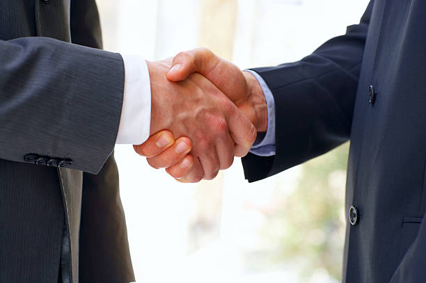 istock Business people shaking hands 144293717